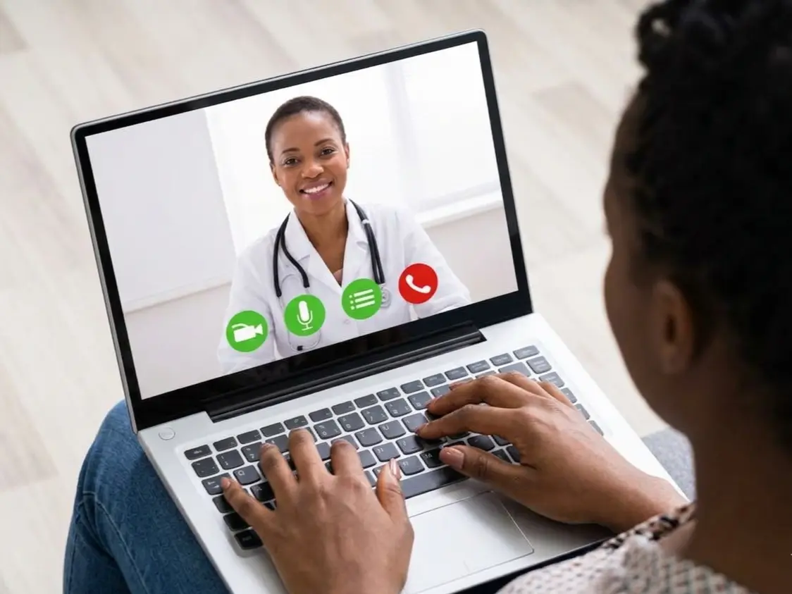 Woman in a comfortable home telehealth session